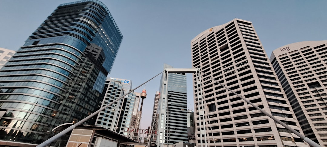 Australian dollar banknotes and coin with a chart illustrating economic growth, representing company gross operating profits.