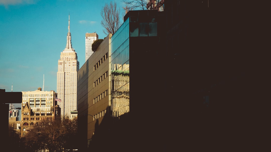 Bitcoin BTC hitting new highs on a digital chart, surrounded by glowing elements representing institutional investment and policy changes.