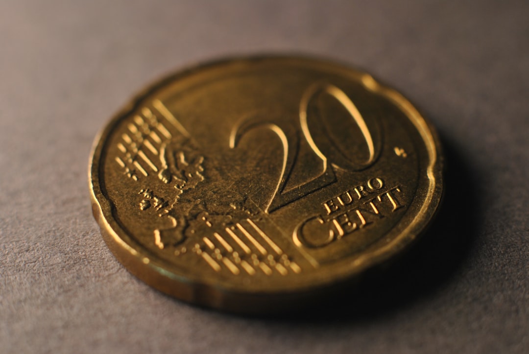 Bitcoin and Ether prices on a digital chart, representing cryptocurrency volatility amidst macro and regulatory factors