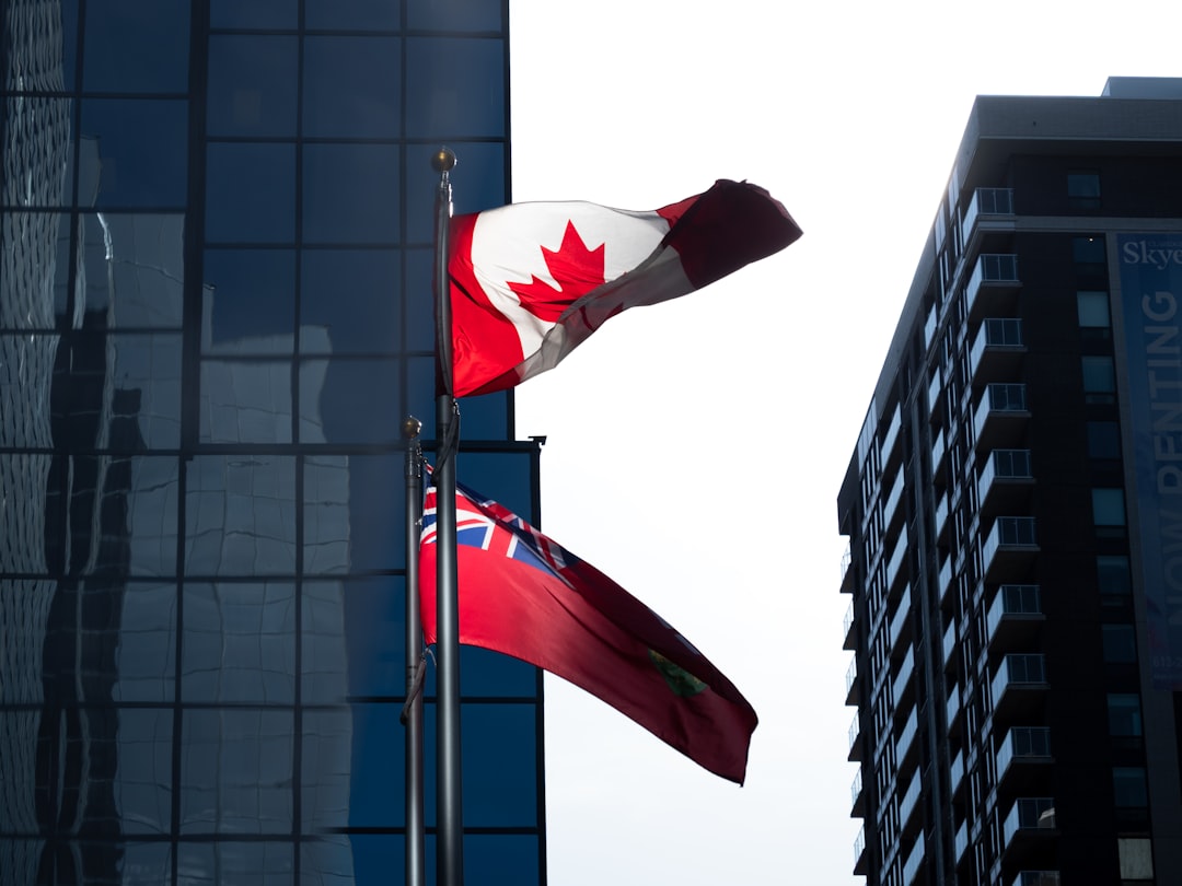 Canadian flag next to a chart showing upward trend, symbolizing economic growth and the rising RMPI