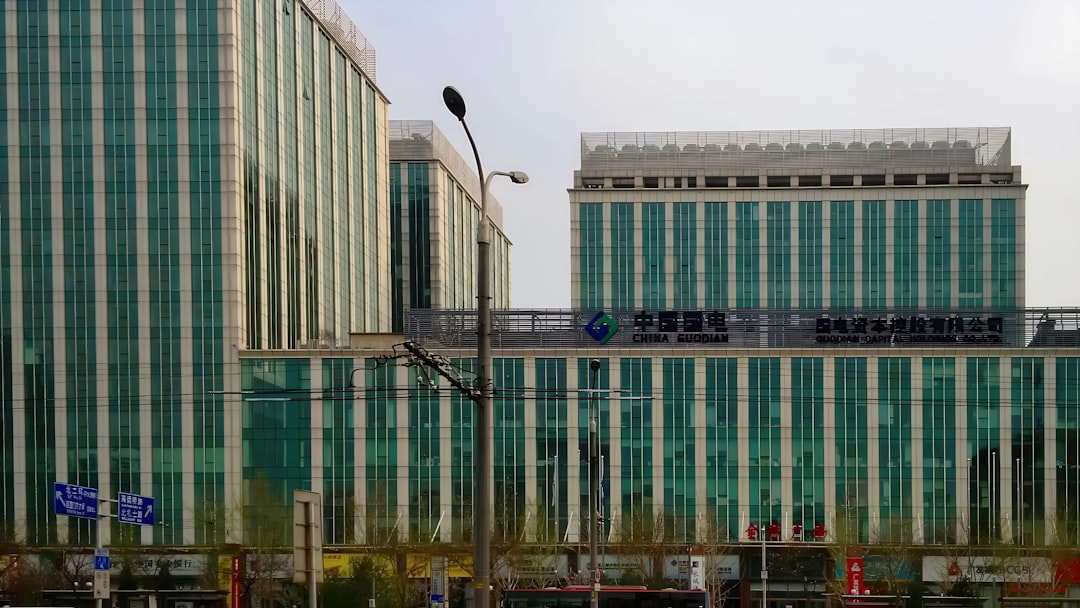 Central bank building with forex charts showing policy divergence and market shifts