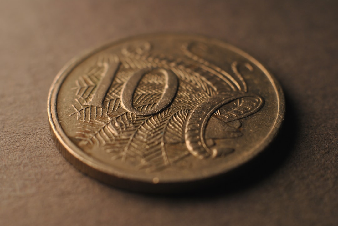 Gold bars and abstract global trade map reflecting critical mineral supply chain resilience