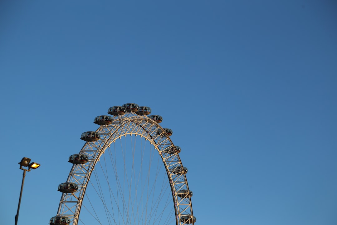 Oil derricks against a sunset, symbolizing crude oil market volatility driven by geopolitics