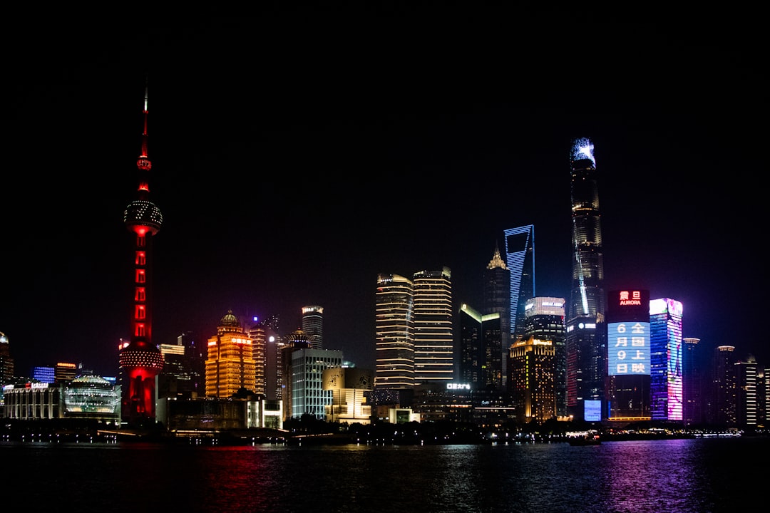 Dash (DASH) cryptocurrency logo displayed against a backdrop of financial charts, symbolizing market analysis and investment.