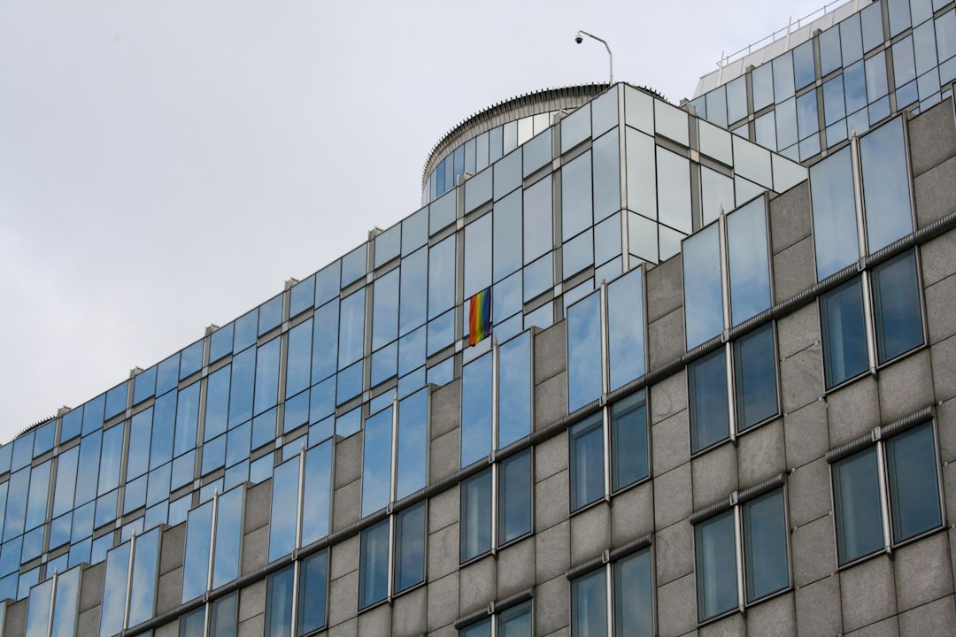 Dubai International Airport (DXB) under a clear sky, symbolizing its pivotal role as a global hub, with subtle hints of geopolitical risk in the background.