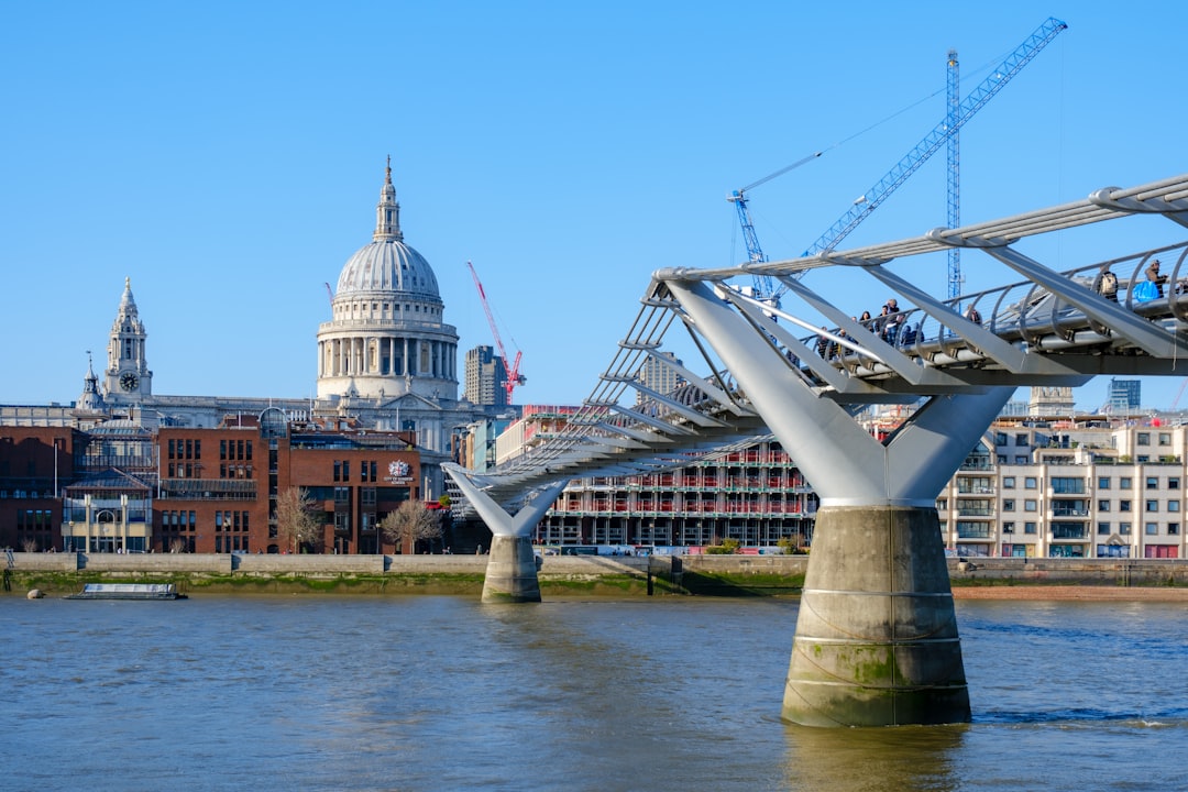 ECB building in Frankfurt with Euro currency symbols overlay