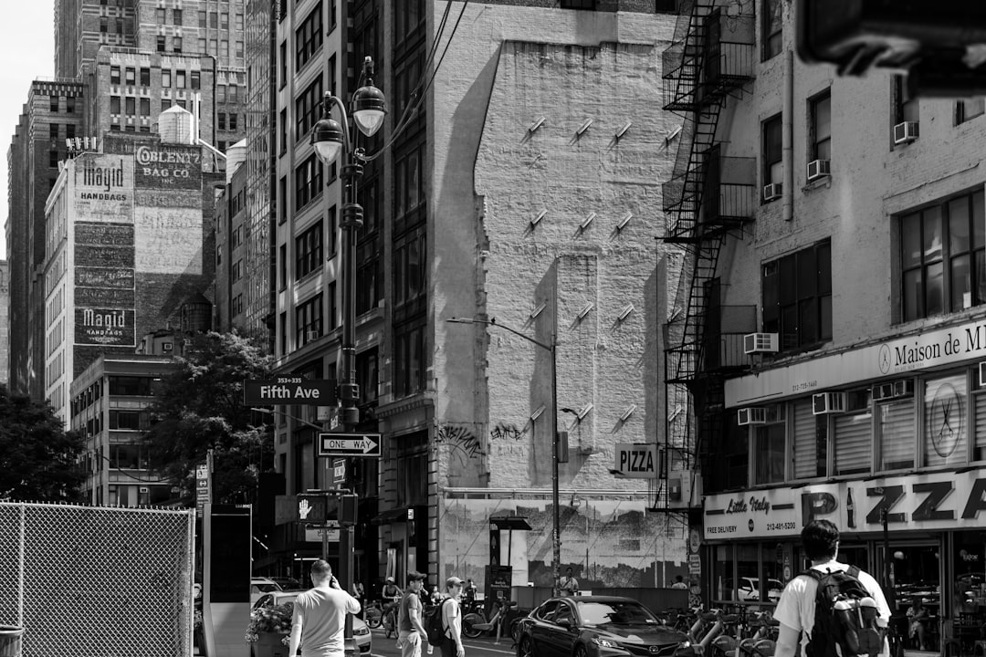 Credit analyst monitoring funding costs and investment-grade spreads on a financial dashboard, with AI infrastructure symbols in the background.