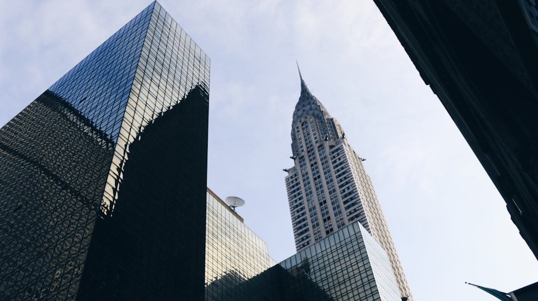 A close-up image of a fuel pump nozzle, symbolizing gasoline trading and energy markets.