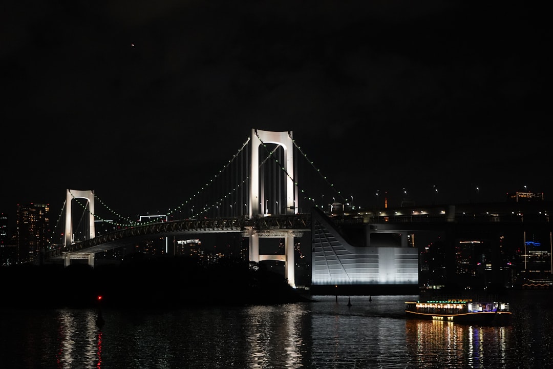 GBPJPY chart showing volatility and key technical levels, with central bank buildings in the background.