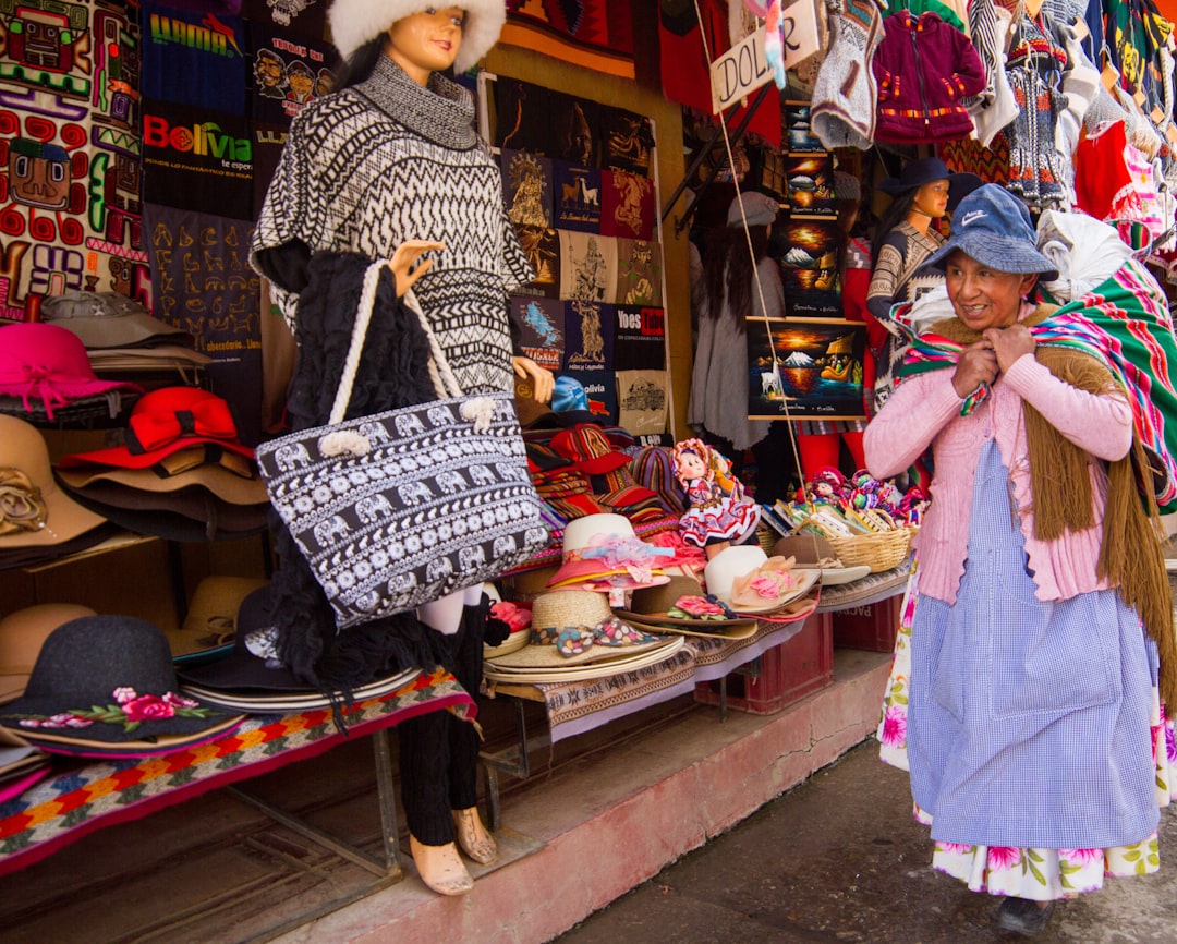 Oil derricks against a sunset, symbolizing an oil-led inflation shock impacting global markets.