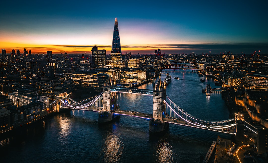 Gold bars neatly stacked with a soft, warm glow indicating value and stability, symbolizing market consolidation after a rally.