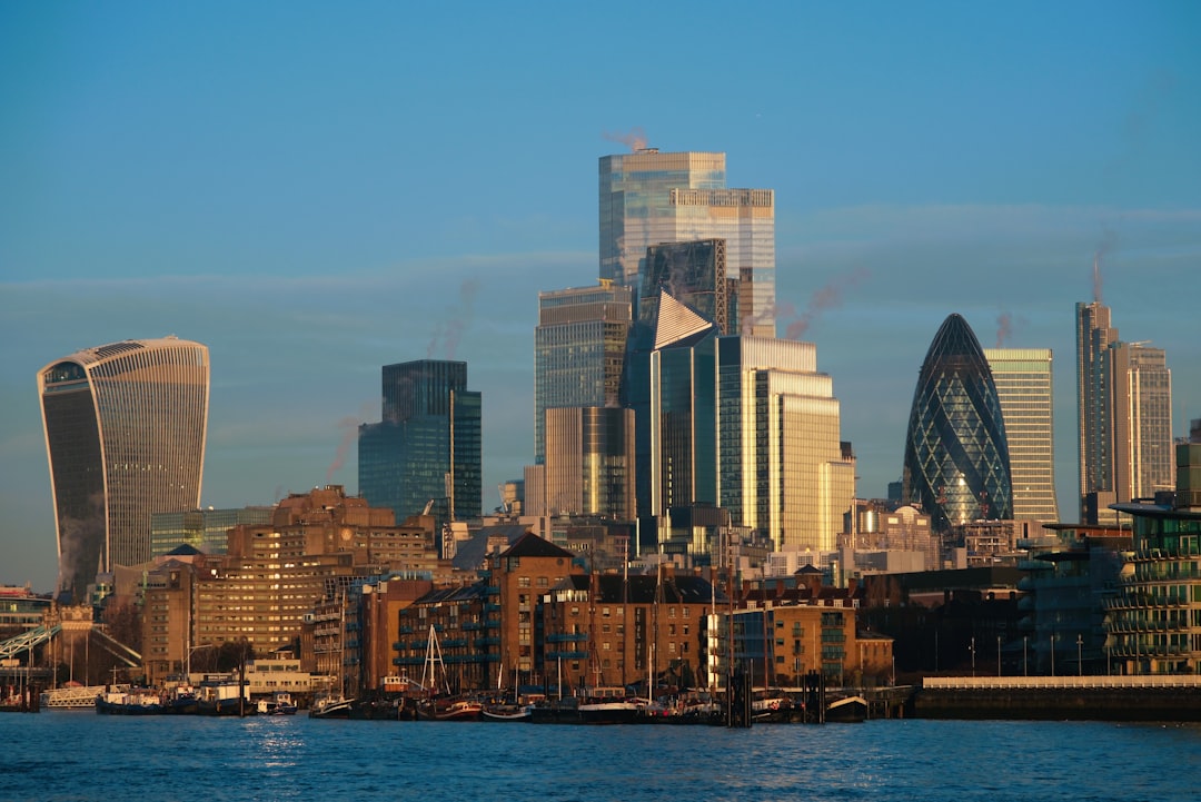 Goldman Sachs building and trading floor representing financial market analysis