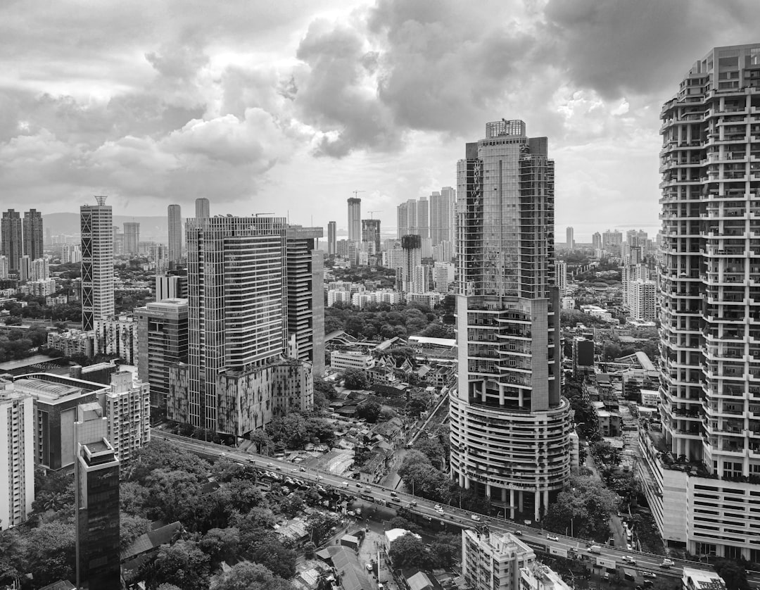 Indian rupee banknotes and US dollar bills symbolizing currency depreciation due to energy shock.