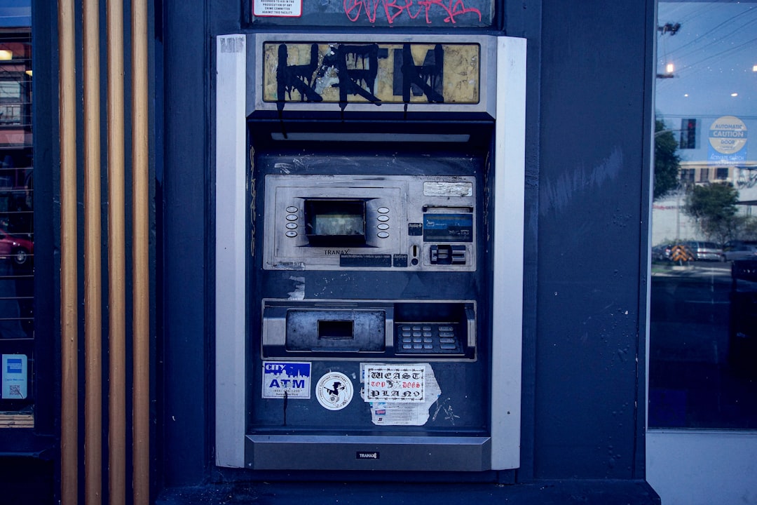 Japanese Yen currency notes and coins with economic charts in the background, symbolizing Japan's trade balance.