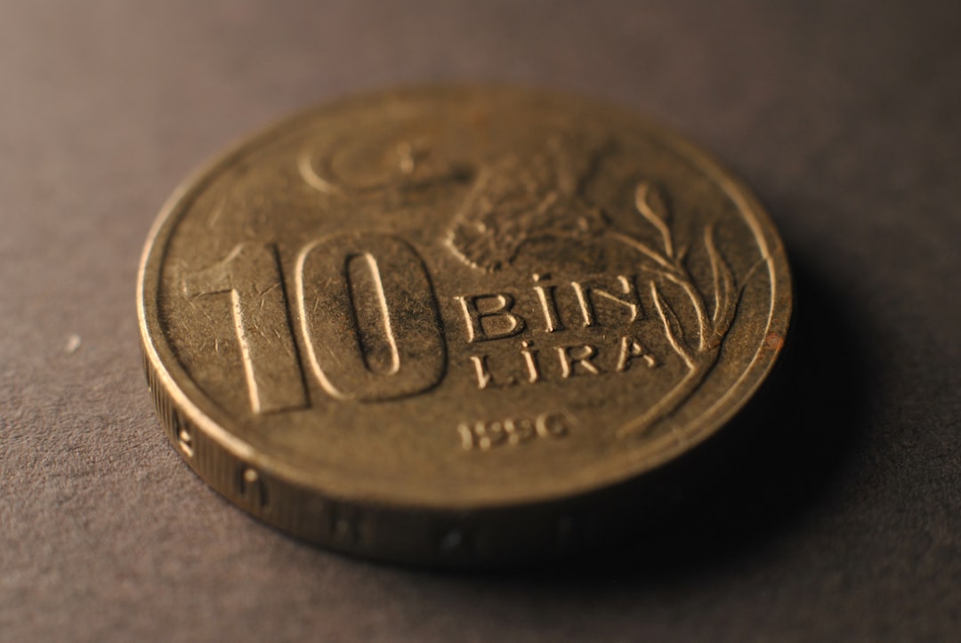 Japanese Yen (JPY) currency notes stacked next to a chart, symbolizing Japan's economic performance and policy implications.