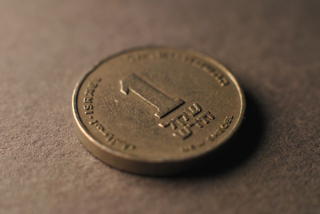 Japanese market trade desk showing USD/JPY charts and inflation data