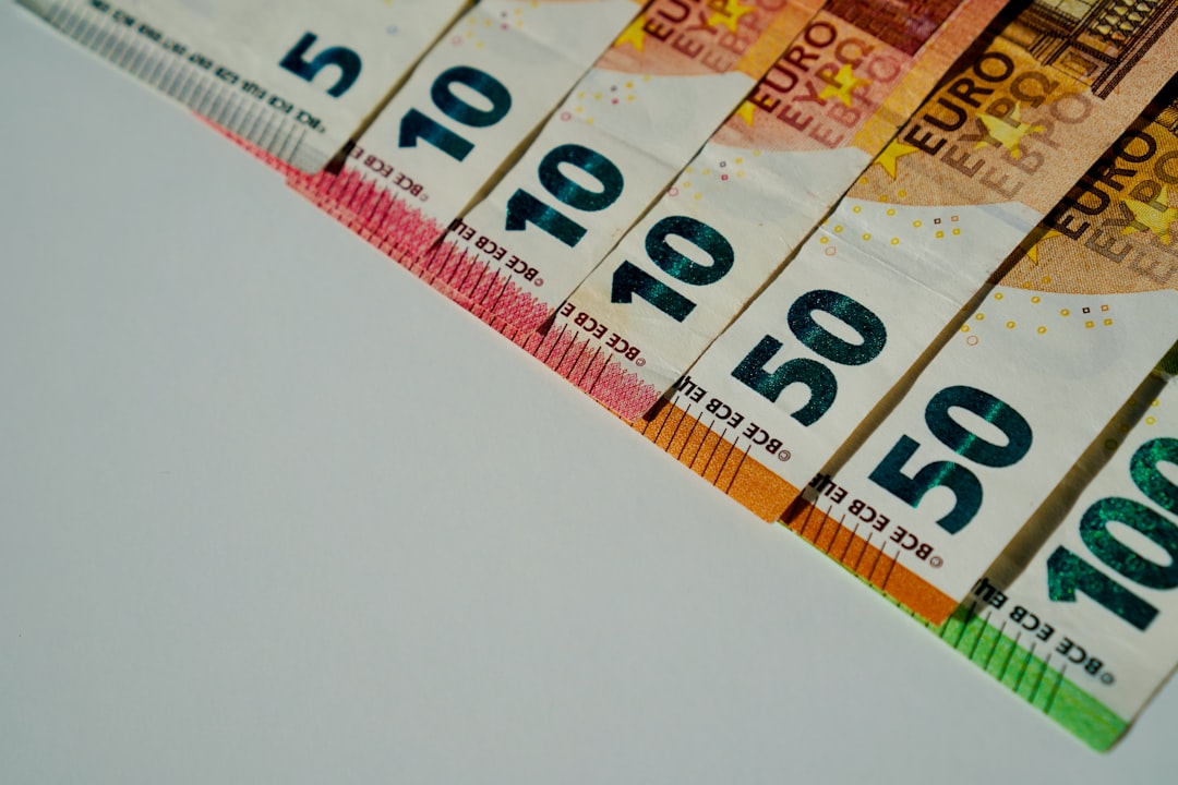 Mexican peso banknotes and coins suggesting economic data impact on currency