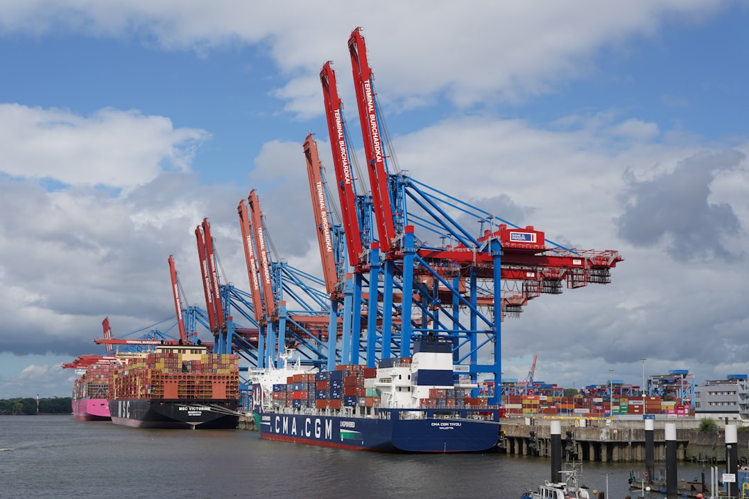 Graph showing converging bond yields from Europe's core and periphery markets, against a backdrop of a blurred trading floor, symbolizing periphery bond compression.