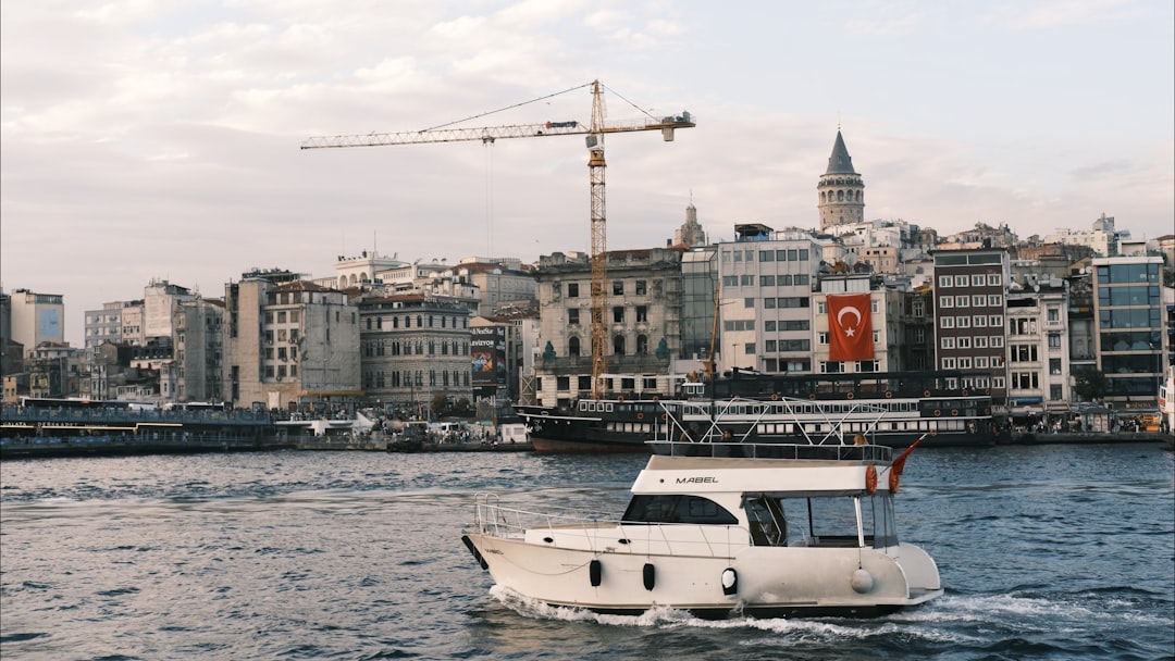 Chart displaying Quant (QNT) price movements, with candlesticks indicating current volatility and trading range against a backdrop of technical indicators.