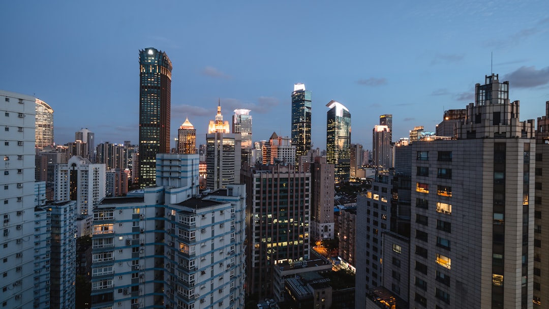 Shanghai skyline with financial district buildings, representing the SHANGHAI Index performance