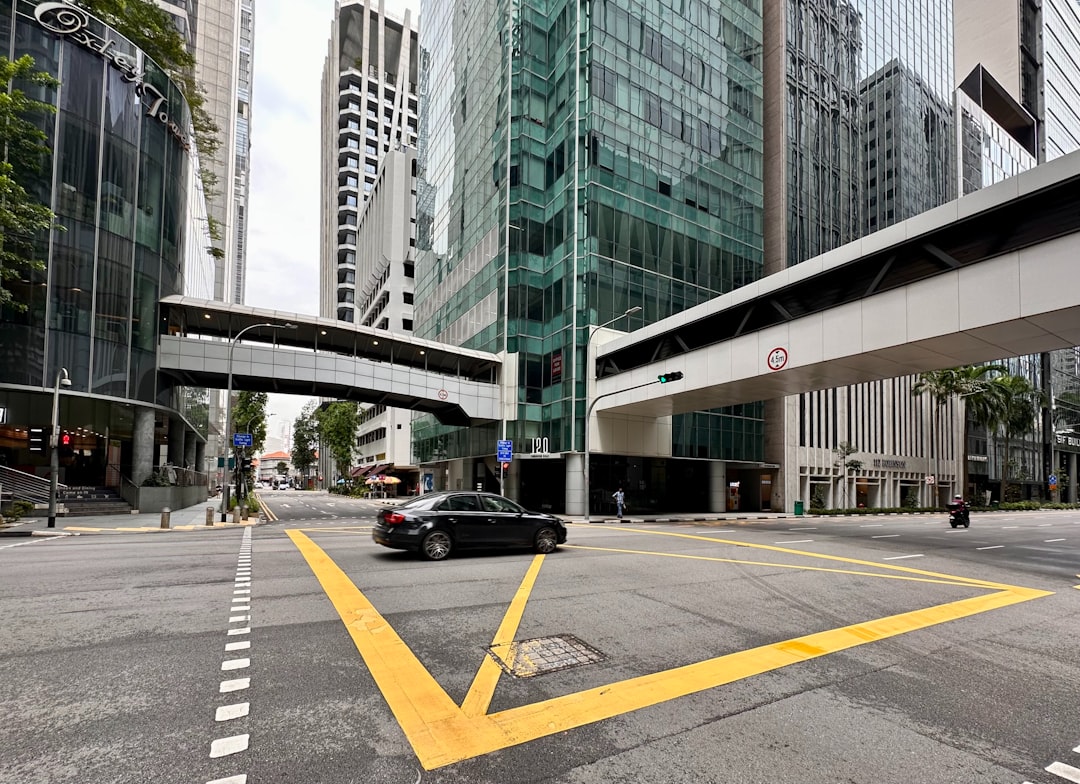 STI Index Chart showing candlestick patterns and volume, with key support and resistance lines.