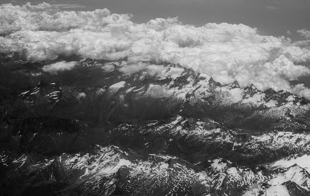 Swedish Krona coins alongside a chart showing inflation data