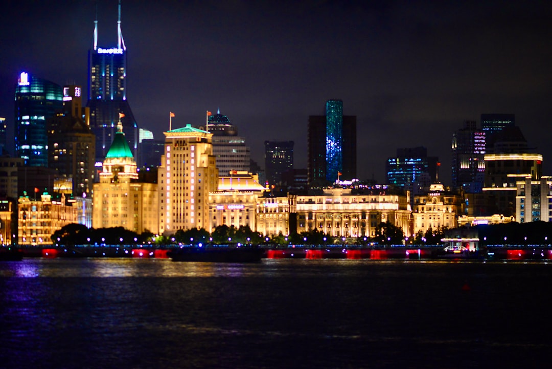 Futuristic autonomous vehicle on a city street representing Tesla Robotaxi scaling challenges