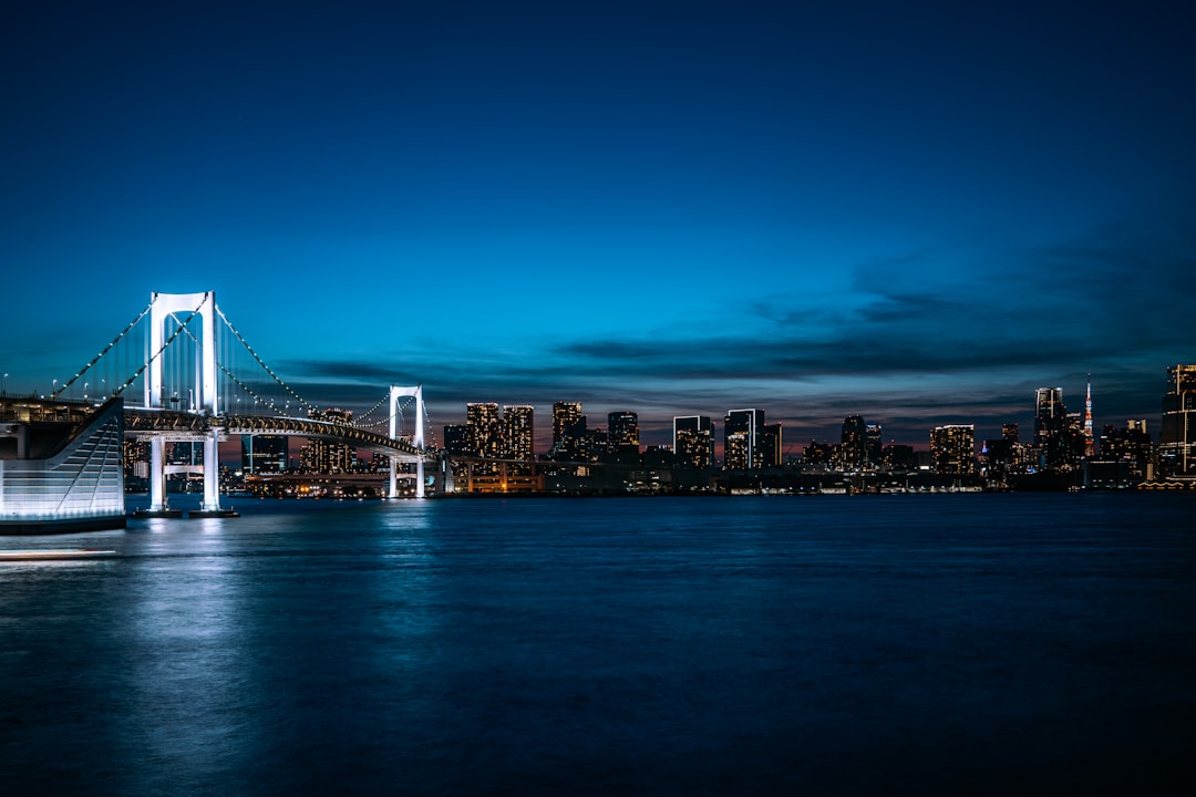 Traders analyzing bond yields and gold charts in a financial office