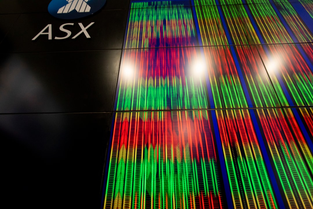 a tall building with a sign that says asx on it