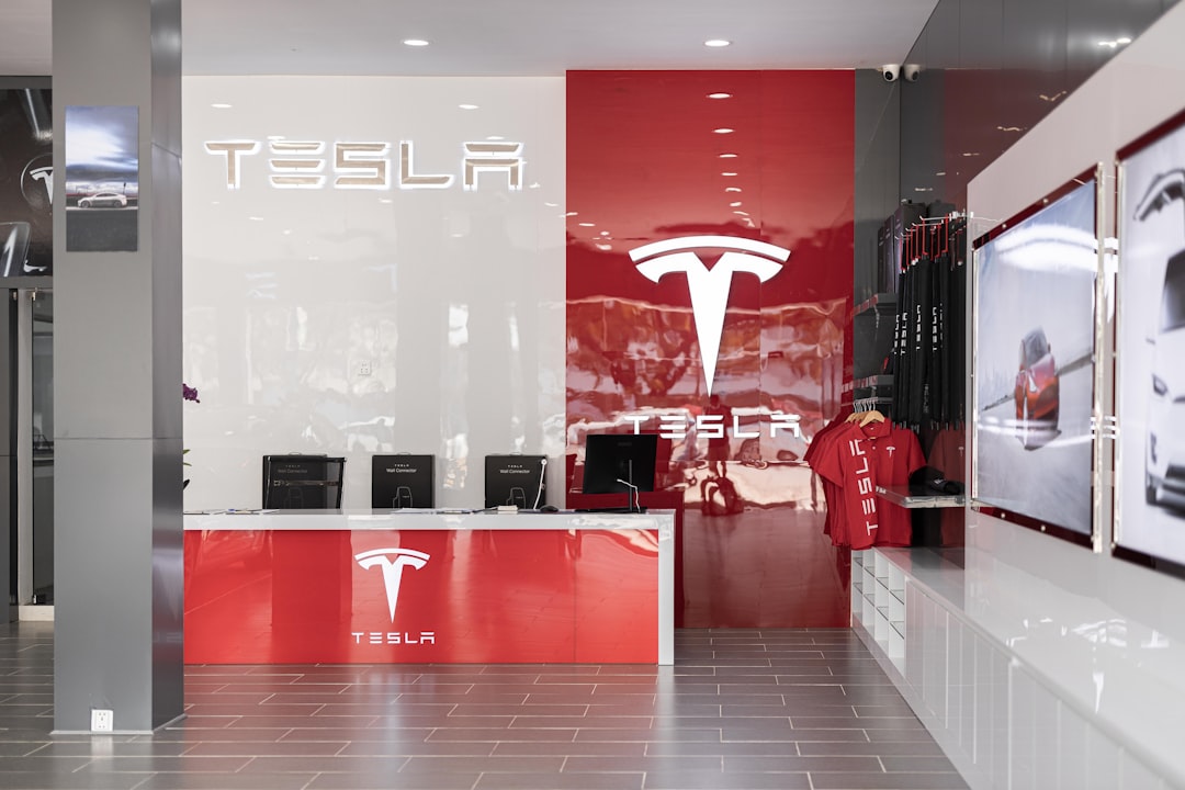 Tesla store exterior, red & white wall, symbolizing TSLA Q4 earnings strategy & guidance