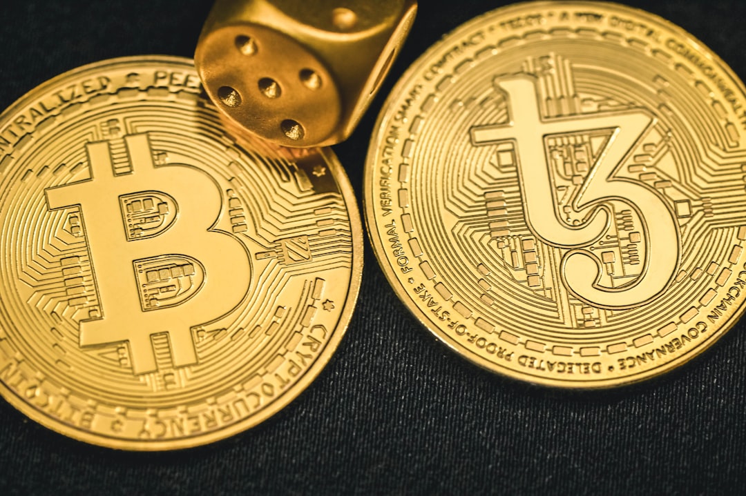 Two gold Bitcoin coins symbolize XAUT's $4,977 resistance amid macro shifts.
