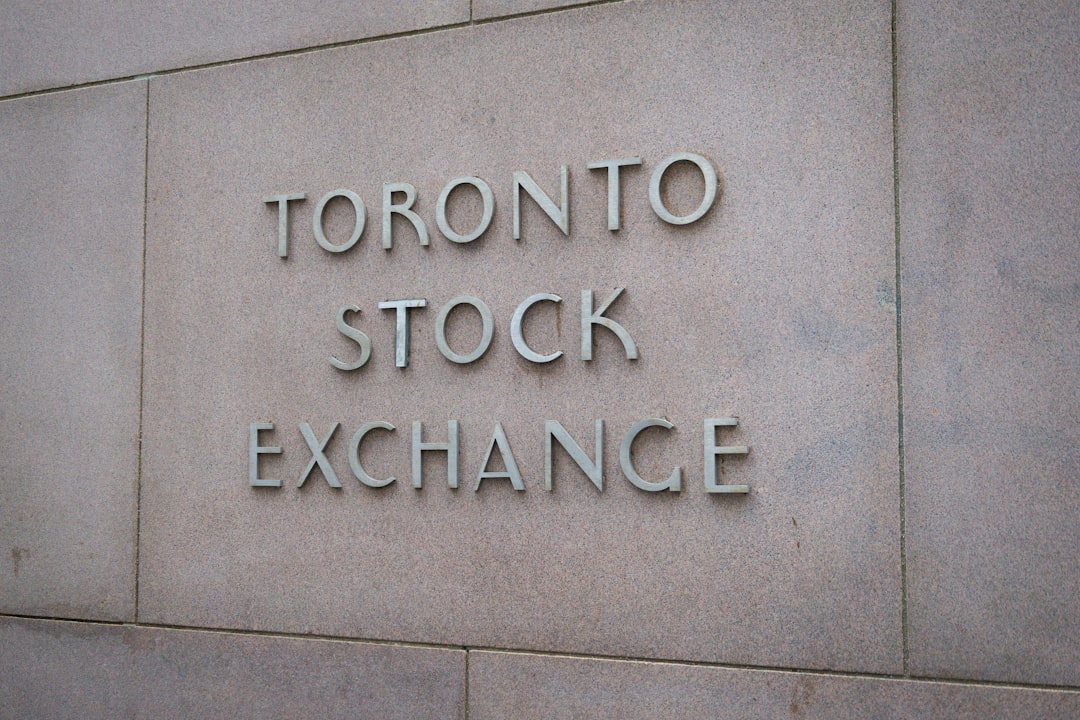 Toronto Stock Exchange sign, hinting at TRON (TRX) trading at $0.2900 pivot.