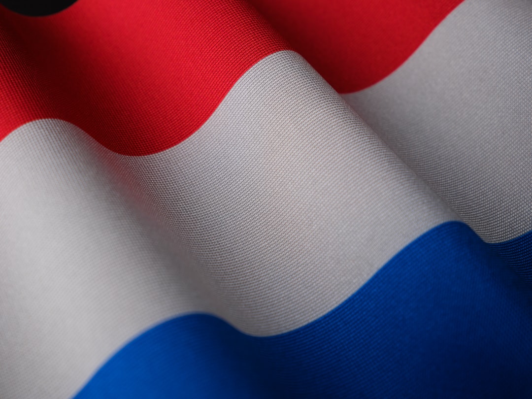 a close up of a red white and blue flag