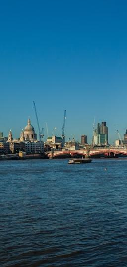 Emerging market currency chart with US dollar overlaid, symbolizing carry trade vulnerability amidst policy shifts