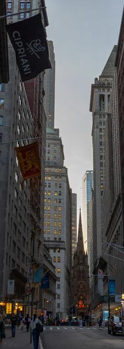 Oil rigs at sunset with a map of the Middle East, symbolizing geopolitical energy risk