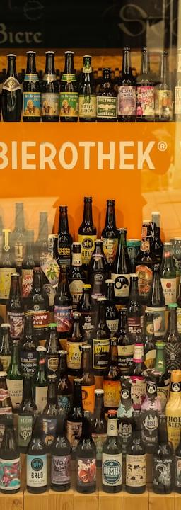 German flag with economic charts overlaid, representing the Germany unemployment rate.