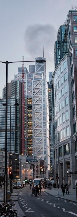 Hong Kong skyline with an overlay of HK50 index chart representing market consolidation