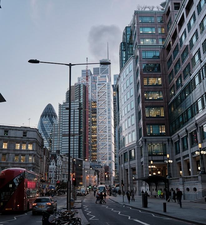Hong Kong skyline with an overlay of HK50 index chart representing market consolidation