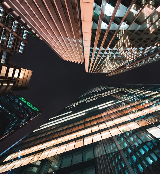 Indonesian rupiah currency notes and trade balance chart reflecting economic data