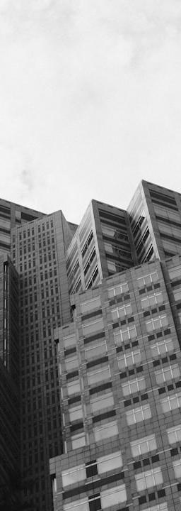 Global supply chain network with economic indicators and world map overlay, symbolizing industrial policy impacts on trade.