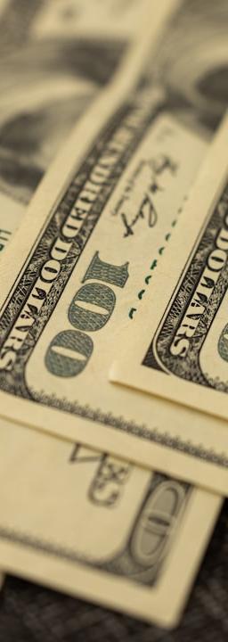 Map of the Middle East highlighting Iran and its surrounding regions, with oil barrels and trade routes superimposed, symbolizing the geopolitical conflict's impact on global markets.