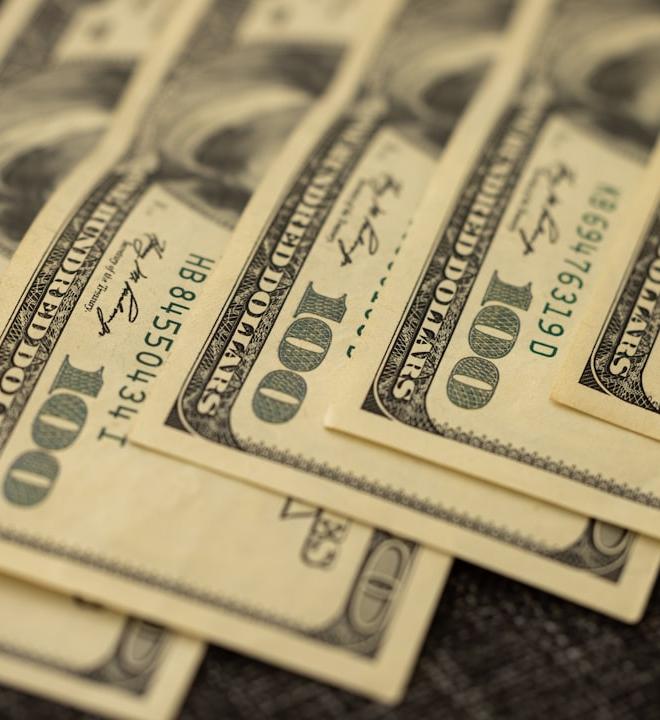 Pepe (PEPE) cryptocurrency chart illustrating price volatility against a backdrop of news headlines.