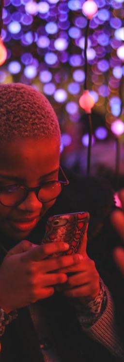 RadNet (RDNT) logo on a digital background symbolizing growth and digital health