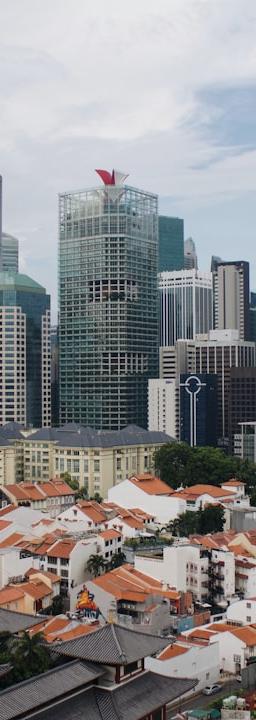 Singapore skyline with trading charts overlaid, representing Straits Times Index (STI) analysis and market consolidation.