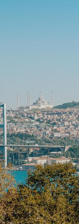 Steel coils stacked in a warehouse, representing the HRC=F commodities market.