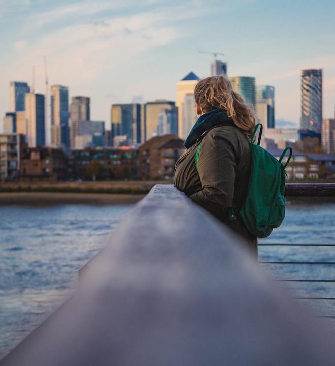Abstract representation of the Sui (SUI) cryptocurrency logo against a dynamic market chart, symbolizing market trajectory and volatility.