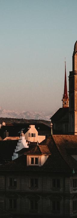 Swiss National Bank building with Swiss flag indicating economic data release and market reaction