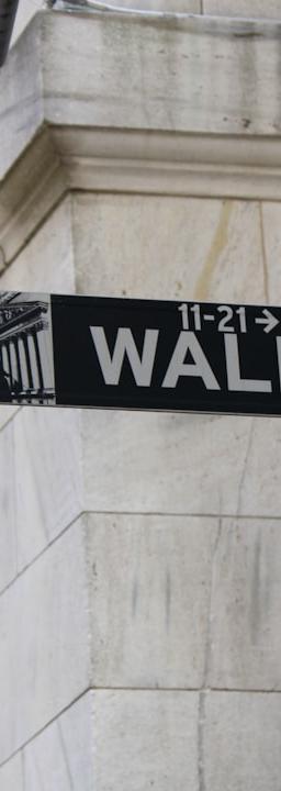 TJX Companies logo on a stock chart showing a slight dip after earnings report