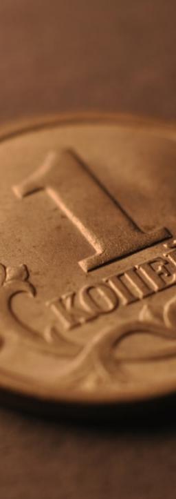 Global supply chain map overlaid with policy documents and mineral icons, symbolizing the new rules of trade and industry.