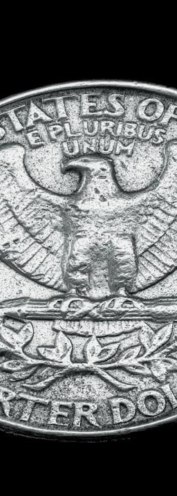 Chart showing United States ISM Manufacturing Prices data on a screen with market graphs in the background